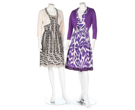 Five Oscar de la Renta summer dresses, modern, labelled, including two with matching cardigans; the first of spotted silk wit