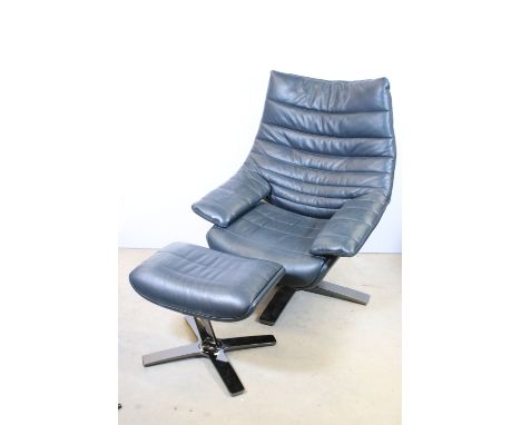 Natuzzi Italian Re-Vive responsive recliner armchair and matching footstool, upholstered in blue leather (2)