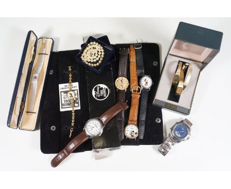 A collection of watches to include Seiko, Timex and Disney examples.