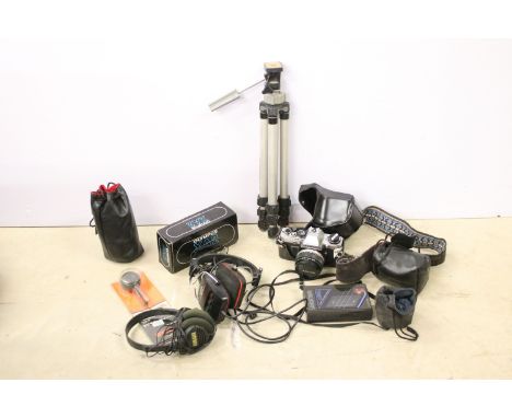 Collection of cameras and equipment to include boxed Olympus XA2, Olympus OM10, tripod stand etc. Together with a Sony Walkma