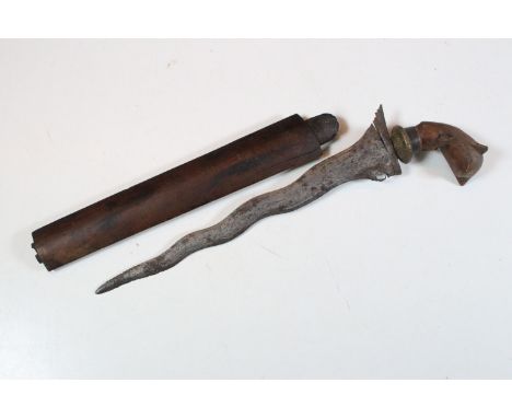 An Indonesian Kris dagger within wooden scabbard. 
