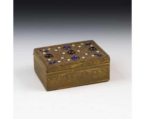A Continental gilt metal trinket box, c.1900, of rectangular form, the hinged lid inset with semi-precious stones, pearls and