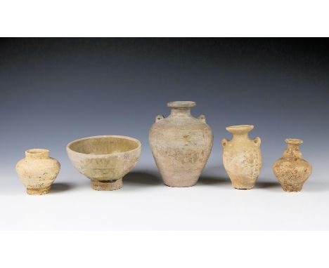 A small collection of ancient Chinese and Burmese pottery, in varying shapes and designs, together with a small painted woode
