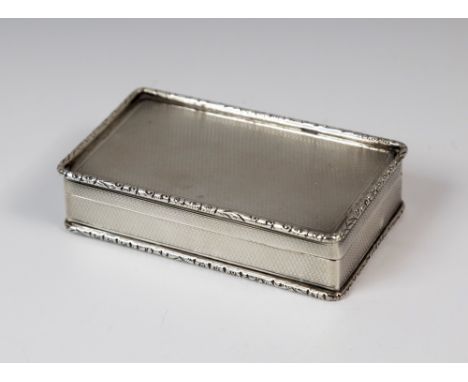 A late George VI silver snuff box, A. Wilcox, Birmingham, 1952, of rectangular form, with engine turning and raised floral ca