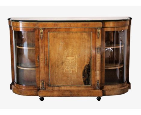 A Victorian walnut, marquetry, ebonised and ormolu mounted credenza, the moulded top over a marquetry frieze and central cupb