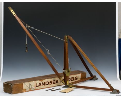 A very rare vintage model of a Derrick crane, by Landsea Models, England, model of a crane is made from mahogany and lacquere