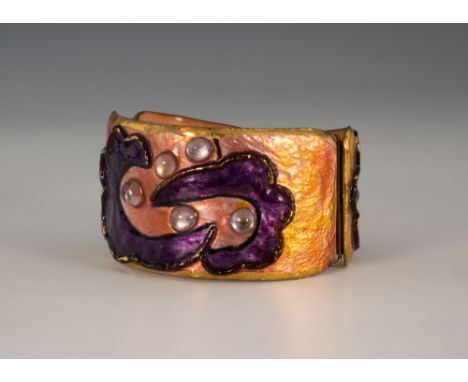 A vintage gilt metal and enamel bangle by Andrée Bazot, 1950s-60s, enamelled in pink, purple and pearl white, signed to insid