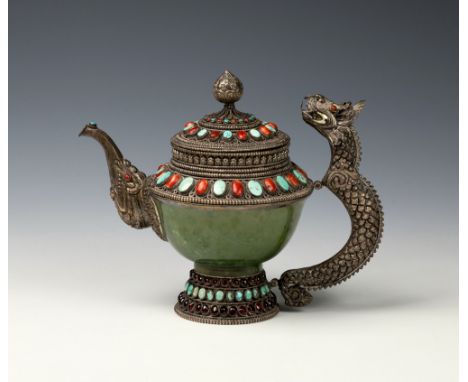 A Tibetan jade, silver and turquoise teapot, 20th century, the polished spinach jade bowl on a turquoise and red stone silver