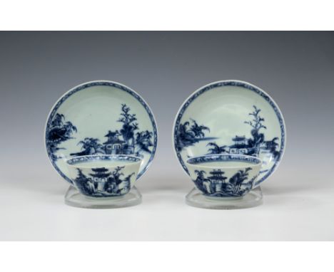 Two Chinese blue and white porcelain tea bowls and saucers from The Nanking Cargo, Qianlong period, c.1750, painted with a pa