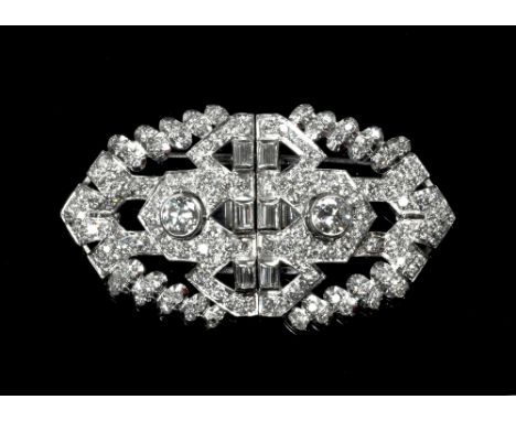 An Art Deco 18ct white gold and diamond double clip brooch, the openwork plaque form brooch set throughout with brilliant, ba