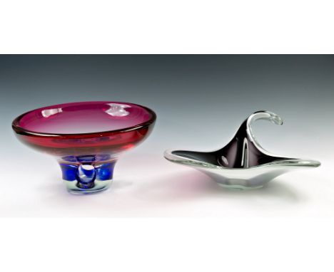 A Flygsfors Coquille cased glass bowl, dated 1960, designed by Paul Kedelv, of stylised ray form, in opaque deep purple and w