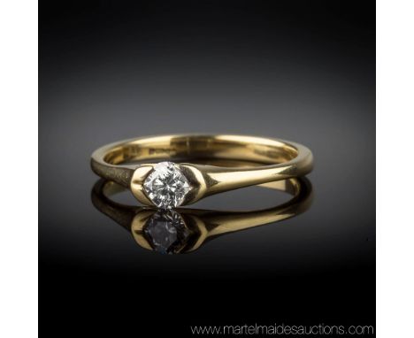 An 18ct yellow gold and diamond solitaire ring, the brilliant cut diamond of good clarity and colour, approx. 0.20ct, in an o