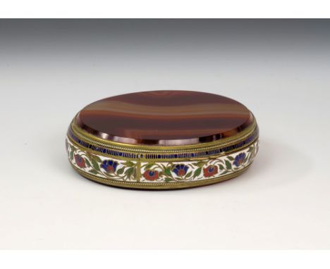 A French 19th century gilt metal, champleve enamel and agate box, oval, the enamelled sides with meandering flowers against a