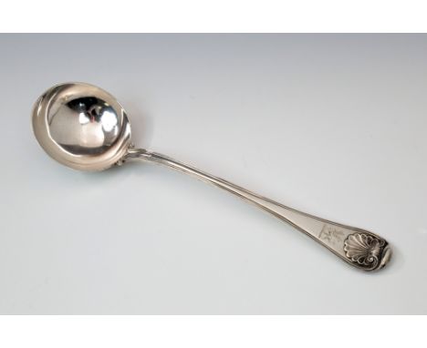 A William IV silver shell thread pattern soup ladle, William Eaton, London 1833, with engraved crest to terminal of a gryphon