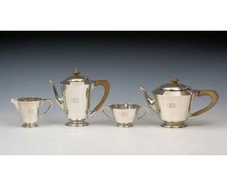 A vintage George VI silver Art Deco style four piece tea and coffee service, Edward Barnard & Sons Ltd, London 1945, consisti