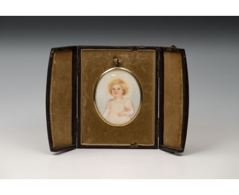 A watercolour on ivory portrait miniature of a young girl, signed and dated Sarah E. Harris 1931, oval, 6.6 x 5.4cm., within 
