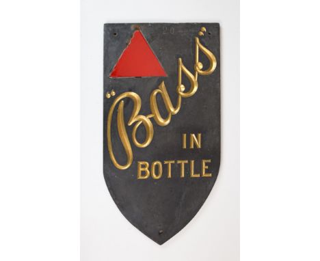 A vintage Bass in Bottle slate pub advertising sign, 1940's, shield shaped sign with enamel red triangle to top & gold letter