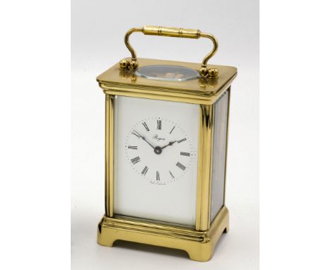 A brass carriage clock by Henley of England, late 20th century, single train movement signed 'Henley England', Roman white en