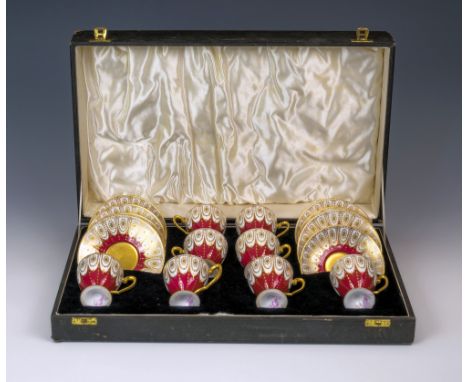 A cased set of eight Royal Worcester for Asprey demitasse coffee cups and saucers, with puce printed factory marks, date code