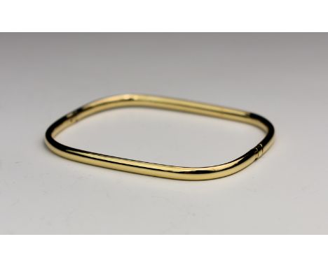 A 14ct yellow gold square bangle