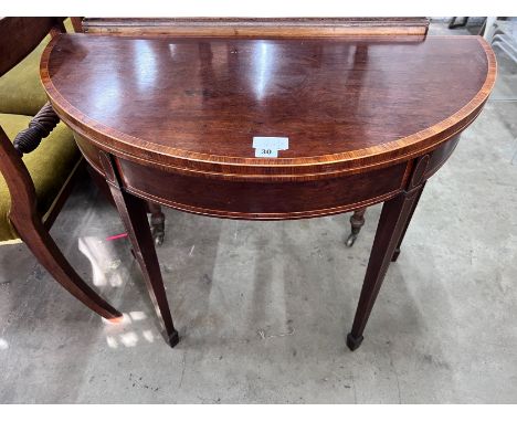 A George III banded mahogany D shape folding card table, width 92cm, depth 45cm, height 73cm *Please note the sale commences 