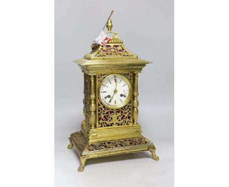 A French cast brass mantel clock in period style, 42cms high