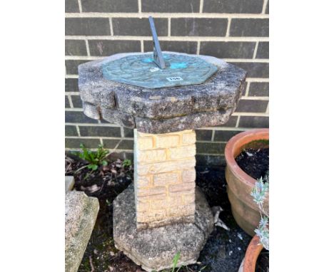 An octagonal reconstituted stone sundial on brick effect pillar, height 75cm *Please note the sale commences at 9am.