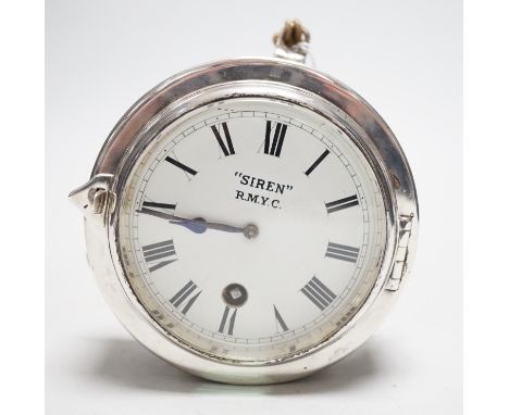 A small silver plated ship's clock, inscribed ‘Siren’ R.M.Y.C.