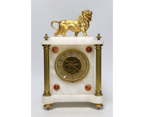 A French alabaster and gilt metal lion and ceramic mounted mantel clock, 34cm high