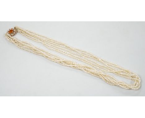 A 1960's Cropp &amp; Farr multi strand seed pearl necklace, with 9ct gold, citrine and split pearl set clasp, 46cm.