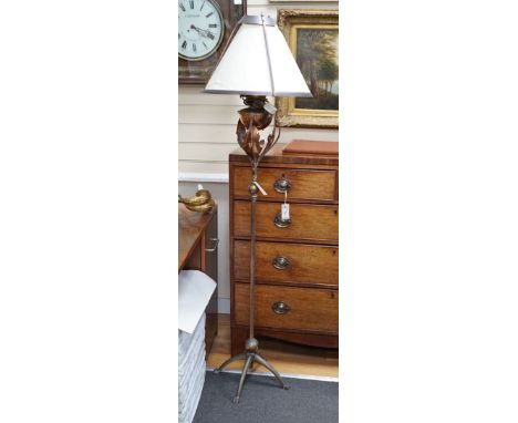 A 1920's brass and copper oil lamp standard converted to electricity, height overall 161cm *Please note the sale commences at