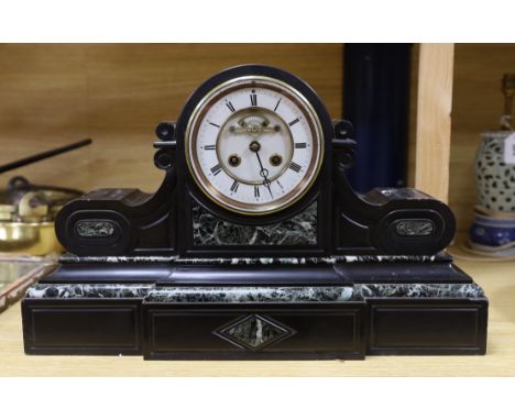 A French eight day slate clock, 50cms wide, 32cms high
