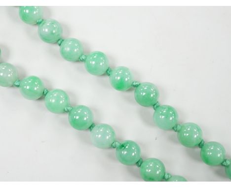 A single strand jade bead necklace, 58cm, gross weight 91 grams.