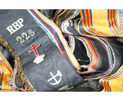 An Orange Order sash, seven Masonic sashes and two aprons