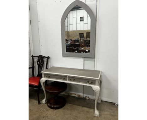 A Chippendale revival later painted two drawer console table, width 127cm, depth 53cm, height 77cm with similar arched mirror