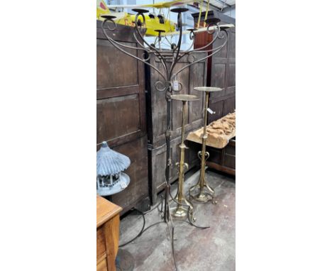 A wrought iron candelabrum lamp standard, height 187cm *Please note the sale commences at 9am.