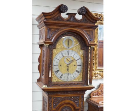 A late Victorian Camerer Cuss &amp; Co carved oak chiming longcase clock, height 237cm *Please note the sale commences at 9am