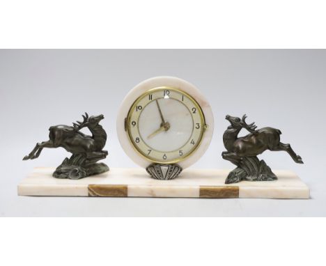 An Art Deco spelter mounted deer marble mantel clock, 47cms wide
