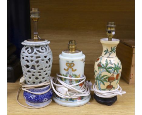A 19th century floral decorated glass lamp and two Chinese lamps, tallest 26cms high