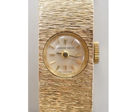 A lady's 9ct gold Buech Girod manual wind bracelet watch, 16.3cm, gross weight 25.3 grams,