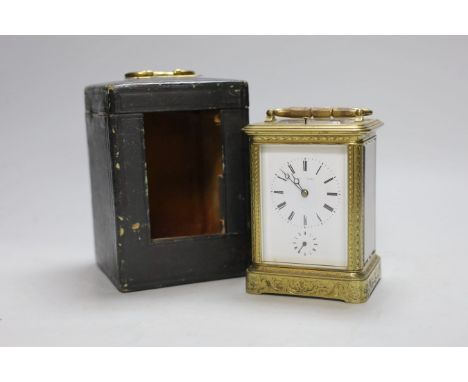 A late 19th century French engraved brass repeating carriage clock with alarm, signed Mottu Freres, Paris, 13cm high