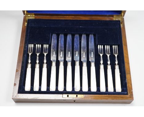 A cased set of six pairs of George V mother of pearl handled silver dessert eaters, Goldsmiths &amp; Silversmiths Co Ltd. Lon