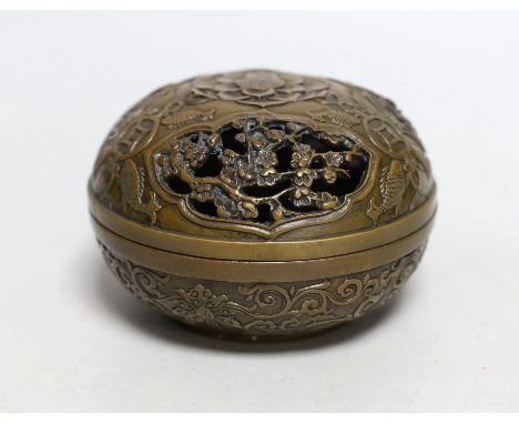 A Chinese circular carved bronze censer, 13.5cm diameter