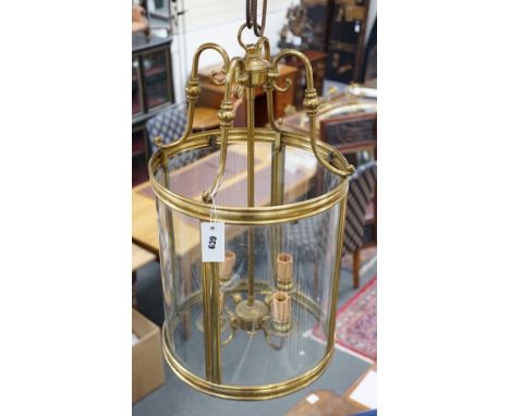 A four light brass hall lantern, 62cm tall