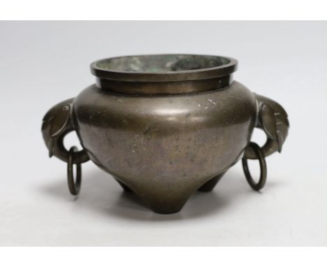 A large Chinese silver inlaid bronze elephant handled censer, signed Sishou, 19th century, 16cms high, 29cm wide