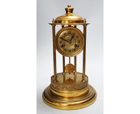 An early 20th century gilt brass pedestal mantel clock, 36cm
