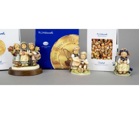 Konvolut aus 3 Hummelfiguren, Goebel, darunter: Enzian-Mädchen, 1972, sign., polychrom bemalt, Modellnr. 351, H. 11,5 cm; Blu