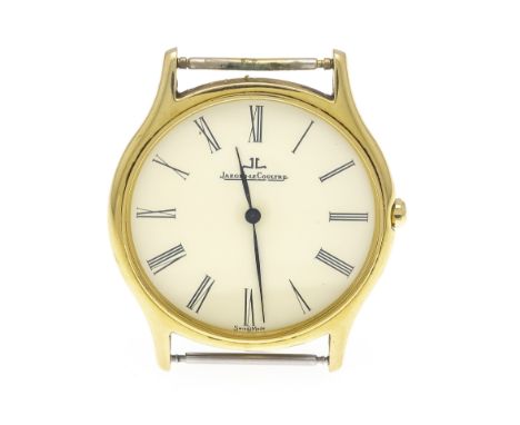 Jaeger LeCoultre, Herrenquarzuhr, 750/000GG, Ref. 140.112.1 um 1980, champagnerf. Zifferblatt mit schwarzen röm. Ziffern und 