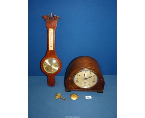 A Westminster chiming Mantle clock, with key and pendulum and a Clevedon Banjo barometer/thermometer.