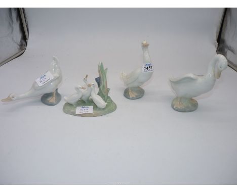 Three Nao figures of Geese and three Geese on a pond, tallest one 6'' high.